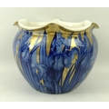 A Wardle jardiniere, in the 'Iris' pattern, circa 1890, with frill rim, the cobalt blue ground outli... 