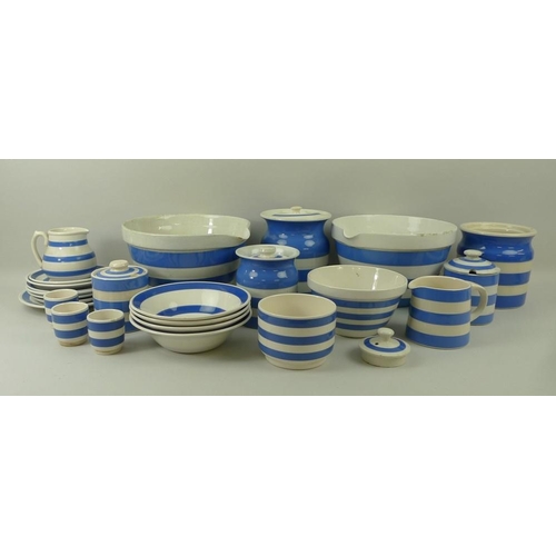 521A - A collection of T. G. Green ceramics in blue and white stripes, comprising a mixing bowl, four lidde... 