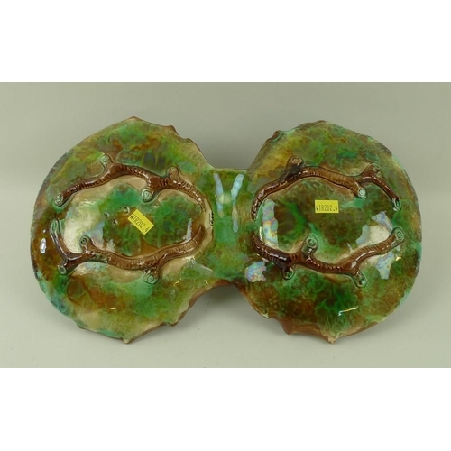 522 - A George Jones majolica hors d'oeuvres dish formed as two polychrome leaf dishes joined by branch wi... 