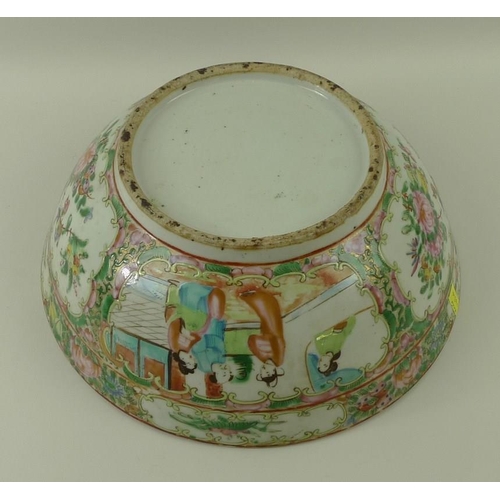 523 - A Canton porcelain bowl with polychrome reserves, decorated to the interior and exterior with four r... 