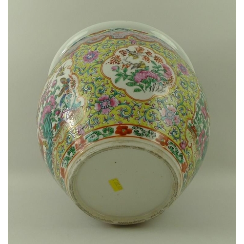 534 - A Chinese famille verte fish bowl, 19th century, the exterior painted with exotic birds below green ... 