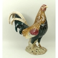 A Beswick ceramic figurine, circa 1970, modelled as a Gamecock, impressed 'Beswick, England, 2059', ... 
