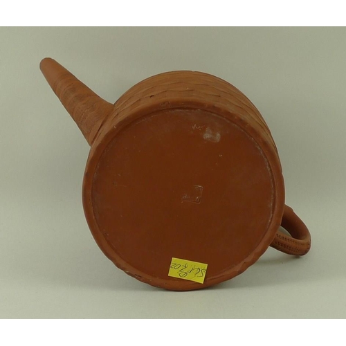 539 - A Chinese Yixing pottery teapot, 19th century, with incised chevron designs, 12cm high.