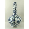A Chinese underglaze blue and white vase, 20th century, with squat body and straight neck, decorated... 