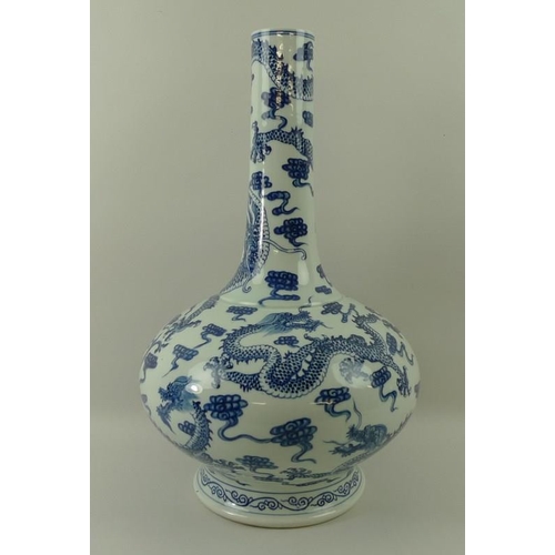 540 - A Chinese underglaze blue and white vase, 20th century, with squat body and straight neck, decorated... 