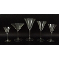 A collection of Art Deco champagne and wine glasses with cone shaped bowls etched with cross hatched... 
