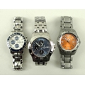A collection of gentleman's Festina timepieces, comprising a wristwatch with orange face, quarter Ar... 