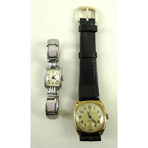 803 - A lady's vintage tank cased Tudor Rolex watch, with Arabic numerals and a further Tudor watch with c... 