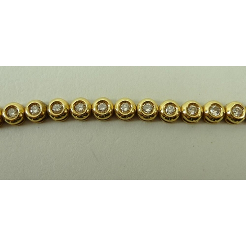 818 - An 18ct gold and diamond bracelet, set with thirty four diamonds, each individually within a circula... 