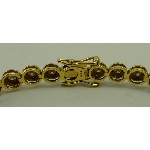 818 - An 18ct gold and diamond bracelet, set with thirty four diamonds, each individually within a circula... 