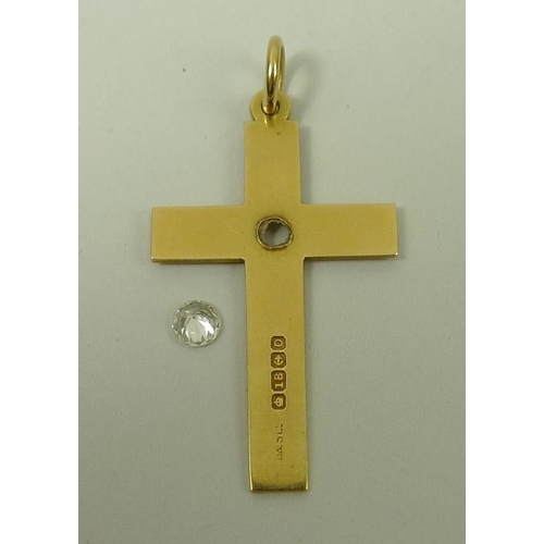 823 - An 18ct gold cross, 3.8g, 4 by 2.5cm, and a now loose 0.25ct diamond.