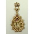 A ruby and diamond necklace, the central Arabesque pendant suspended below a trefoil, marked 18ct to... 