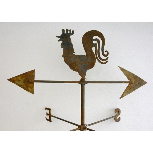 835 - A mid to late 20th century cast iron and steel weather vane, with cockerel finial, 83 by 184cm high.