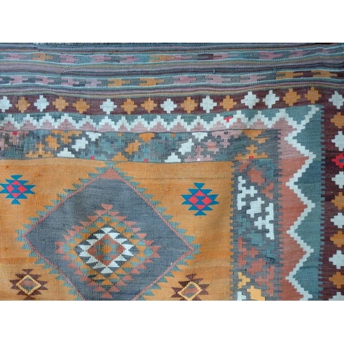 844 - Two early 20th century Kelim rugs, orange ground, 278 by 148cm, and pink ground, 268 by 134cm. (2)