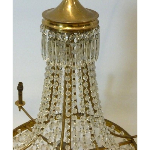 845 - A 1950's bag chandelier ceiling light fitting, with brass frame, six branches, and glass drops, 65 b... 