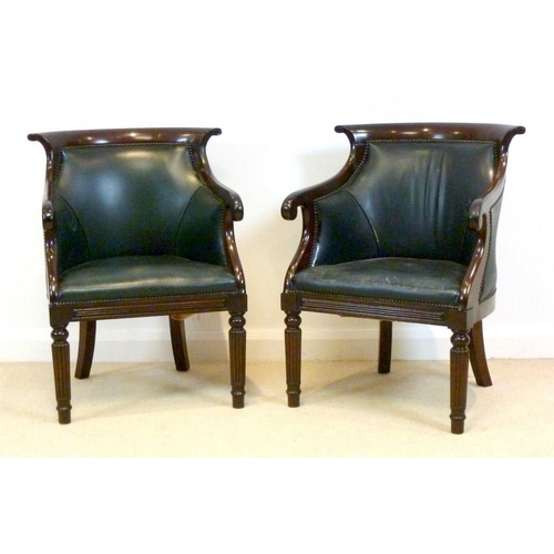 849 - A pair of modern reproduction library chairs, in the Regency style, upholstered with green leather, ... 