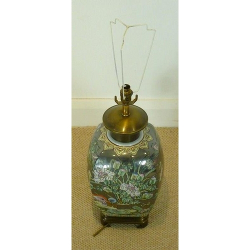 853 - A contemporary Chinese style ceramic table lamp, the silvered background and floral design with Mand... 