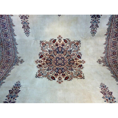 854 - A mid 20th century Axbury carpet, with open beige ground, central floral and foliate medallion, dark... 