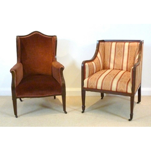 855 - An Edwardian mahogany wing armchair with box and ebony inlay, pink velour upholstery on square taper... 