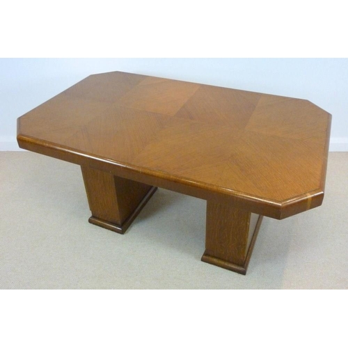 857 - An Art Deco oak veneered twin pedestal desk, the top with canted corners, 157 by 96 by 79cm high.