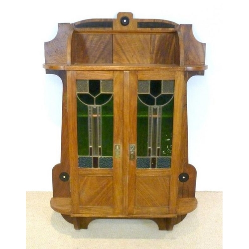 859 - An early 20th century Indian wall mounted medicine cabinet, in the English style, with glazed doors ... 