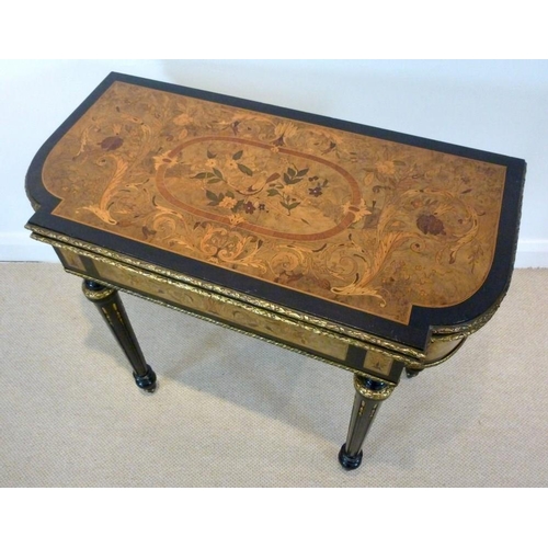 899 - A French 19th century, Louis Philippe, ebonised and ormolu mounted card table, the surface profusely... 