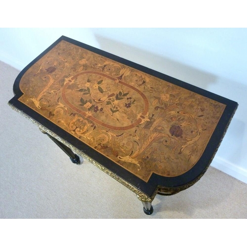 899 - A French 19th century, Louis Philippe, ebonised and ormolu mounted card table, the surface profusely... 