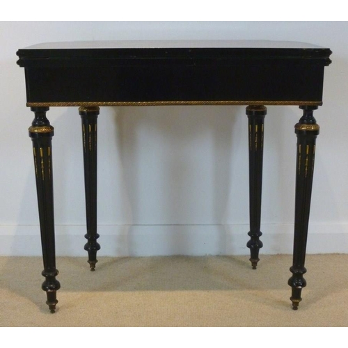 899 - A French 19th century, Louis Philippe, ebonised and ormolu mounted card table, the surface profusely... 