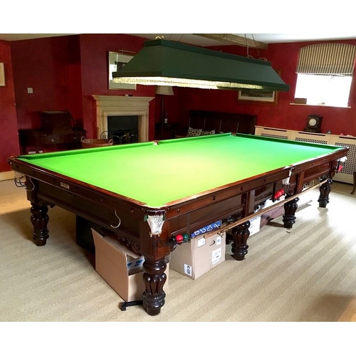 1033 - A full sized billiards table in the William IV style, on mahogany lobed baluster legs, by Palmer and... 