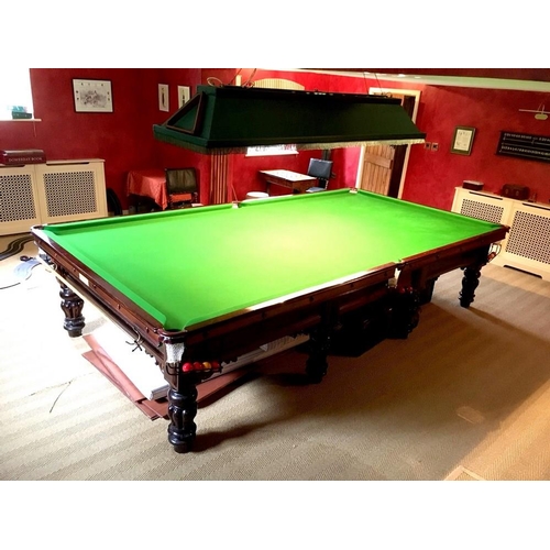 1033 - A full sized billiards table in the William IV style, on mahogany lobed baluster legs, by Palmer and... 