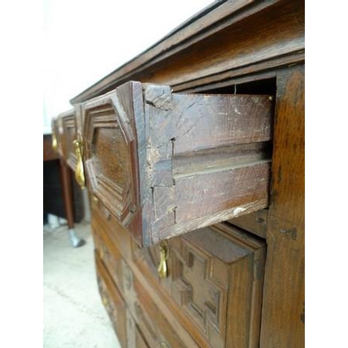 1042A - A Restoration oak chest of four drawers, circa 1680, being the top section of a chest on stand, with... 