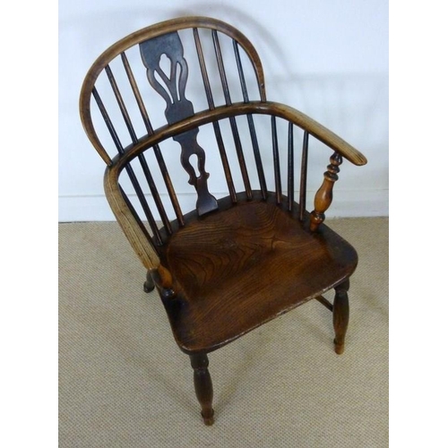 1046 - A 19th century grandfather and grandmother Windsor chair, stamped to side of seat 'Nicholson, Rockle... 