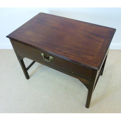 1054 - An early George III mahogany side table, circa 1760, the rectangular top with a moulded edge above a... 