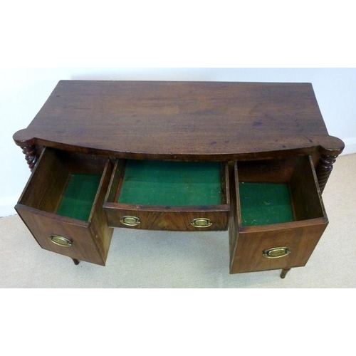 1055 - A Regency mahogany bowfront sideboard, circa 1820, the top with outset rounded corners over one shal... 