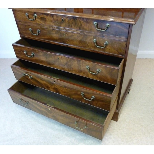 1058 - A George III mahogany secretaire cabinet, circa 1775, the acanthus carved fretwork swan-neck pedimen... 