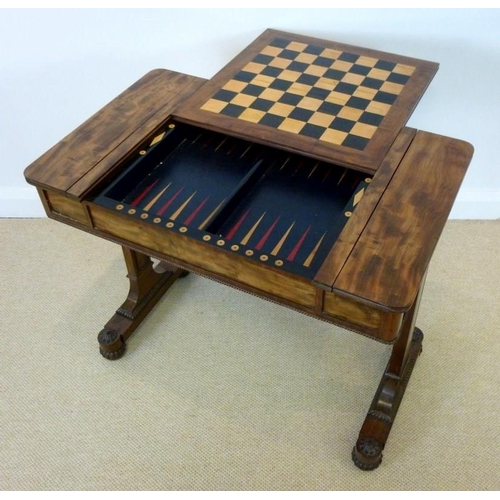 1060 - A William IV mahogany games table, circa 1830, the rounded rectangular top with a reversible games b... 