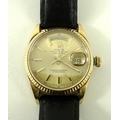 An 18K gold cased Rolex Oyster Perpetual Day-Date gentleman's wristwatch, the face with baton numera... 