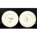 A pair of Wedgwood porcelain plates, mid to late 20th century, for Roland Ward after the design by O... 