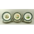 A set of twelve Minton porcelain 'botanical' cabinet plates, each hand painted with a different flow... 
