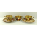 A Royal Worcester trio, comprising tea cup, saucer and plate, signed H Aynton and Moseley, and anoth... 