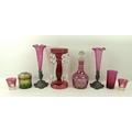 A collection of glassware comprising a pair of 19th century cranberry flutes, 22cm, a cranberry lust... 