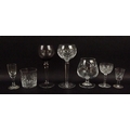 A group of cut glass wares, comprising a set of six cut glass hock glasses, seven amethyst glass hoc... 