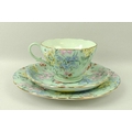 A Shelley part tea service in the Melody pattern, comprising six tea cups, saucers, and tea plates, ... 