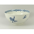 A first period Worcester bowl, circa 1770, with under glaze cobalt blue sprigs, blue crescent mark t... 