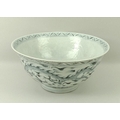 A Chinese porcelain bowl, late 19th/early 20th century, the interior incised with Prussian blue drag... 