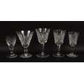 A group of Waterford table glasses, comprising five red wine, five white wine, and two sherry glasse... 