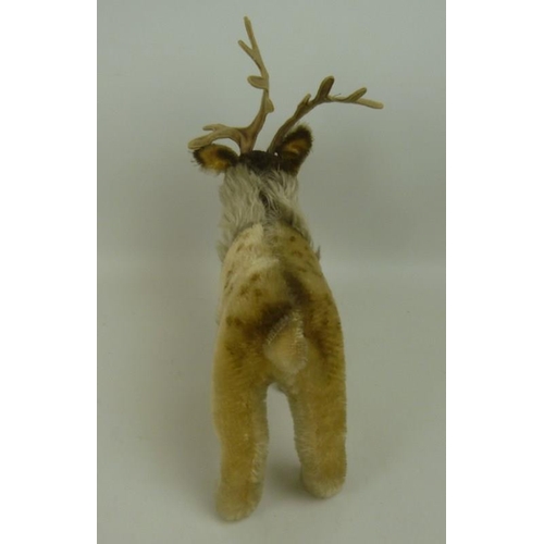 641 - A Steiff Renny Reindeer, circa 1960, mohair, glass eyes, wired antlers, original paper tag 'Steiff-O... 