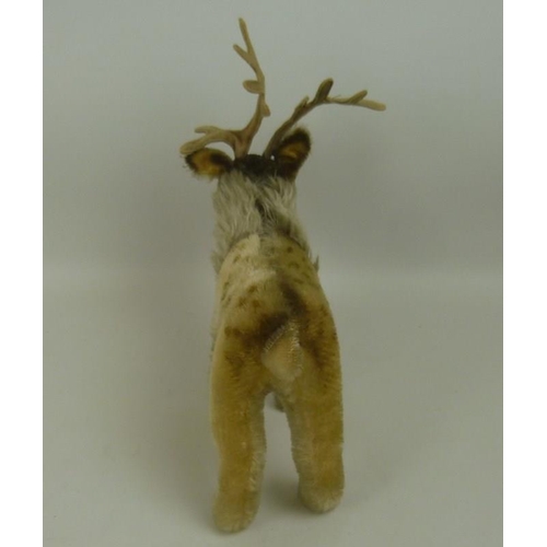 641 - A Steiff Renny Reindeer, circa 1960, mohair, glass eyes, wired antlers, original paper tag 'Steiff-O... 