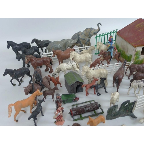 642 - A collection of 1950's Britains farm yard animals and exotic zoo animals mostly plastic with some le... 