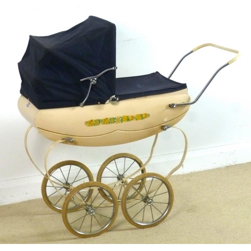 644 - A 1960's Triang coach built child's pram, 39 by 104 by 51cm.